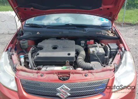 2009 Suzuki Sx4 Touring z USA, uszkodzony, nr VIN JS2YB417495101631